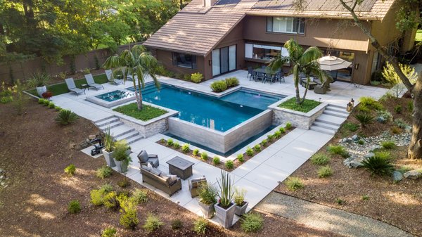 Gold River Modern Pool with Outdoor Living - This backyard overhaul transformed the space to create a luxury oasis that you'll never want to leave. Gold River Modern Pool with Outdoor Living - This backyard overhaul transformed the space to create a luxury oasis that you'll never want to leave.