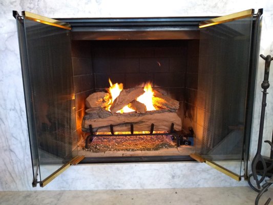 Fireplace conversion - Converted old fireplace to gas burning fireplace.  Stunning, the results and performance.