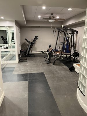 Home gym assembly. - A customer hired another moving company to unload their belongings and didn't quite finish the job, so we came in and executed a precise and careful assembly!
