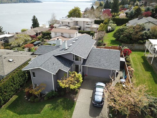 CertainTeed NorthGate Max Def Moire Black Roof Replacement - Lake Forest Park, WA - Cornerstone Roofing replaced the composition roof on this Lake Forest Park, WA home with new CertainTeed NorthGate Max Def Moire Black asphalt/ composition shingles.
The homeowner kindly shared, “Impressed with services provided by our Estimator, our Operations Manager coordinating the roofing process, the office staff answering questions, staff on roof and our Final Technician for inspection. All were responsive and quick with communication.”
Project was completed in 2 days. CertainTeed NorthGate Max Def Moire Black Roof Replacement - Lake Forest Park, WA - Cornerstone Roofing replaced the composition roof on this Lake Forest Park, WA home with new CertainTeed NorthGate Max Def Moire Black asphalt/ composition shingles.
The homeowner kindly shared, “Impressed with services provided by our Estimator, our Operations Manager coordinating the roofing process, the office staff answering questions, staff on roof and our Final Technician for inspection. All were responsive and quick with communication.”
Project was completed in 2 days.