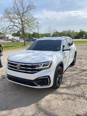 2022 VW Atlas - This Atlas came to us for our complete 360 package, that included all side windows, sunroofs, back glass along with the windshield. Customer stated “I get sunburns when driving long road trips” not anymore she wont! This vehicles appearance changed completely when on the road. Ms. Vanna fell in love all over again with her ride once she came to pick it up. 2022 VW Atlas - This Atlas came to us for our complete 360 package, that included all side windows, sunroofs, back glass along with the windshield. Customer stated “I get sunburns when driving long road trips” not anymore she wont! This vehicles appearance changed completely when on the road. Ms. Vanna fell in love all over again with her ride once she came to pick it up.