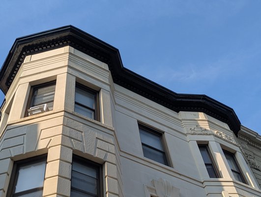 Cornice Repair and Repainting - Inspect the affected cornice areas to identify damage, deterioration, or loose components.
Perform necessary repairs to restore structural integrity and proper alignment of the cornice, including re-securing or replacing damaged sections as required.
Prepare all surfaces by removing loose, peeling, and deteriorated paint using appropriate methods to achieve a sound substrate.
Clean and properly prepare the surface to ensure adequate adhesion of new coatings.
Apply primer where needed, followed by a finish coat of paint to match the existing or specified color.
Ensure a uniform, clean finish consistent with surrounding surfaces. Cornice Repair and Repainting - Inspect the affected cornice areas to identify damage, deterioration, or loose components.
Perform necessary repairs to restore structural integrity and proper alignment of the cornice, including re-securing or replacing damaged sections as required.
Prepare all surfaces by removing loose, peeling, and deteriorated paint using appropriate methods to achieve a sound substrate.
Clean and properly prepare the surface to ensure adequate adhesion of new coatings.
Apply primer where needed, followed by a finish coat of paint to match the existing or specified color.
Ensure a uniform, clean finish consistent with surrounding surfaces.