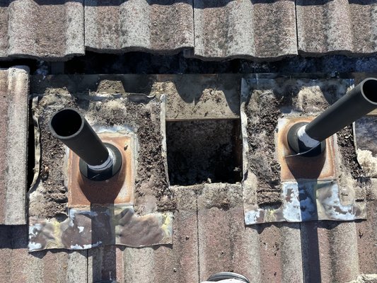 Tile roof maintenance - Example of what tile roof maintenance looks like, its important to have the flashings cleaned for proper water flow, make sure the collar on the pipe is sealed properly, these flashings were spray painted for a cosmetic touch & to reduce the chances of further corrosion