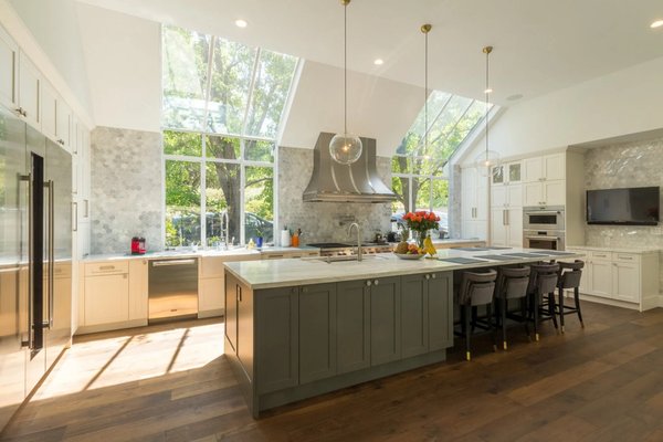 Kitchens - Our kitchen remodeling portfolio showcases a blend of sophistication and functionality. Whether it's the sleek modernity of minimalist designs with their clean lines and bold color contrasts, the timeless elegance of classic wooden cabinetry, or the cozy allure of traditional styles, our work speaks to a variety of tastes and preferences. Each kitchen is a testament to our commitment to quality craftsmanship, with every detail thoughtfully considered to create spaces that are not just visually stunning, but also highly practical. Our designs incorporate the latest in kitchen technology and trends, ensuring that your space is as efficient as it is beautiful. From luxurious marble countertops to state-of-the-art appliances, and custom cabinetry that maximizes space, our kitchens are tailored to meet the unique needs and desires of our clients. Let us transform the heart of your home into a place where memories are made and cherished. Kitchens - Our kitchen remodeling portfolio showcases a blend of sophistication and functionality. Whether it's the sleek modernity of minimalist designs with their clean lines and bold color contrasts, the timeless elegance of classic wooden cabinetry, or the cozy allure of traditional styles, our work speaks to a variety of tastes and preferences. Each kitchen is a testament to our commitment to quality craftsmanship, with every detail thoughtfully considered to create spaces that are not just visually stunning, but also highly practical. Our designs incorporate the latest in kitchen technology and trends, ensuring that your space is as efficient as it is beautiful. From luxurious marble countertops to state-of-the-art appliances, and custom cabinetry that maximizes space, our kitchens are tailored to meet the unique needs and desires of our clients. Let us transform the heart of your home into a place where memories are made and cherished.
