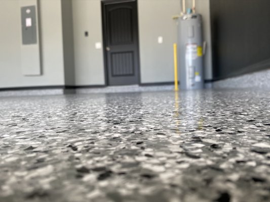 Epoxy floor - STEP 1
We start Cleaning with acid to process your existing floor. This acid ventures that the industrial 2-part epoxy seeps into the mechanically opened capillaries of your floor surface to create a solid-state bond with absolutely no peeling properties. Note: If there is any crack or pit repair to be done, a second technician will be using a “crack runner” tool to prepare the cracks and pits for our “flaw repair” compound.
STEP 2
We calculate the exact chemical mixture needed for the base coat of our industrial 2-part epoxy. This base coat must be applied flawlessly and with exact preciseness to insure a complete, seamless, beautiful finish. The chemical is poured and spread with rollers. The reaction time of this chemical mixture varies according to temperature and moisture. Our installer technicians are trained in assessing and manipulating this cure time if needed.
STEP 3
One of the extra advantages of a Lifetime Epoxy chip-coverage floor is that we always
broadcast 100% chip coverage. We elect to do this for three reasons; 1. It makes your look great
with a terrazzo or granite like finish. 2. Full chip coverage provides better cushion and added
protection for your floor surface. 3. 100% chip coverage makes the floor finish perfectly uniform
PRO PAINTING
with a texture finish. Some homeowners elect to go with solid colors. If you desire a textured solid floor finish, our technicians call add a “granular agent” to provide a more non-slip finish.
STEP 4
A topcoat of polyurea is added. This is one of the most difficult challenges of epoxy floor
installation. The reaction time of this topcoat is another factor that our trained technicians can
determine and properly adjust to if necessary. Application speed, uniform tool movements, and
proper application approach is crucial during this final stage to insure a consistent, uniform,
and aesthetically appealing floor that has the durability and performance level we warrant our floors to provide. This topcoat is formulated to provide UV protection and extremely durable finish. Epoxy floor - STEP 1
We start Cleaning with acid to process your existing floor. This acid ventures that the industrial 2-part epoxy seeps into the mechanically opened capillaries of your floor surface to create a solid-state bond with absolutely no peeling properties. Note: If there is any crack or pit repair to be done, a second technician will be using a “crack runner” tool to prepare the cracks and pits for our “flaw repair” compound.
STEP 2
We calculate the exact chemical mixture needed for the base coat of our industrial 2-part epoxy. This base coat must be applied flawlessly and with exact preciseness to insure a complete, seamless, beautiful finish. The chemical is poured and spread with rollers. The reaction time of this chemical mixture varies according to temperature and moisture. Our installer technicians are trained in assessing and manipulating this cure time if needed.
STEP 3
One of the extra advantages of a Lifetime Epoxy chip-coverage floor is that we always
broadcast 100% chip coverage. We elect to do this for three reasons; 1. It makes your look great
with a terrazzo or granite like finish. 2. Full chip coverage provides better cushion and added
protection for your floor surface. 3. 100% chip coverage makes the floor finish perfectly uniform
PRO PAINTING
with a texture finish. Some homeowners elect to go with solid colors. If you desire a textured solid floor finish, our technicians call add a “granular agent” to provide a more non-slip finish.
STEP 4
A topcoat of polyurea is added. This is one of the most difficult challenges of epoxy floor
installation. The reaction time of this topcoat is another factor that our trained technicians can
determine and properly adjust to if necessary. Application speed, uniform tool movements, and
proper application approach is crucial during this final stage to insure a consistent, uniform,
and aesthetically appealing floor that has the durability and performance level we warrant our floors to provide. This topcoat is formulated to provide UV protection and extremely durable finish.