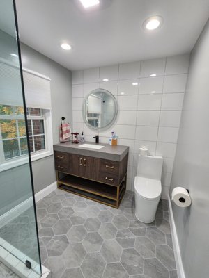 Home Remodeling - Burke, VA - This was a bathroom renovation in which we had to relocate the shower, shift some walls around and add a laundry room in place of the small closet in the hallway. The homeowners were great to work with and we appreciate their business. Keep us posted if you need our services in the future. A project like this takes on average about 3-4 weeks, but due to delays in supply chains sometimes can stretch a little bit further. If you are interested in our services and would like to acquire more info in regard of a project you are planning, get in-touch either through yelp messages or give us a call - 703 940 6260.