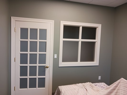 Financial Advising Firm Office Repaint - In this project, I completed a full repaint for an associate at a financial advising firm who wanted to refresh her private office. As part of the project, we began with a personalized color consultation to help her find the perfect tone. She was looking for something cozy and inviting, with a preference for darker, richer colors. After reviewing several options, she chose Evergreen Fog (SW9130)—a warm, moody green from Sherwin-Williams that brings both calm and character to the space, replacing the previous drab gray that had made the room feel cold and uninspiring.
Before painting, we carefully repaired extensive wall damage, including gouges and surface wear from moving furniture and general use as well as nail holes from pictures and decorations. Once the repairs were complete, we applied Cashmere Interior Acrylic Latex in an eggshell finish, which gave the room a smooth, elegant look with just the right amount of sheen.
By the time we finished, the walls looked flawless and the space felt both professional and welcoming—perfect for hosting clients in comfort and style. Financial Advising Firm Office Repaint - In this project, I completed a full repaint for an associate at a financial advising firm who wanted to refresh her private office. As part of the project, we began with a personalized color consultation to help her find the perfect tone. She was looking for something cozy and inviting, with a preference for darker, richer colors. After reviewing several options, she chose Evergreen Fog (SW9130)—a warm, moody green from Sherwin-Williams that brings both calm and character to the space, replacing the previous drab gray that had made the room feel cold and uninspiring.
Before painting, we carefully repaired extensive wall damage, including gouges and surface wear from moving furniture and general use as well as nail holes from pictures and decorations. Once the repairs were complete, we applied Cashmere Interior Acrylic Latex in an eggshell finish, which gave the room a smooth, elegant look with just the right amount of sheen.
By the time we finished, the walls looked flawless and the space felt both professional and welcoming—perfect for hosting clients in comfort and style.