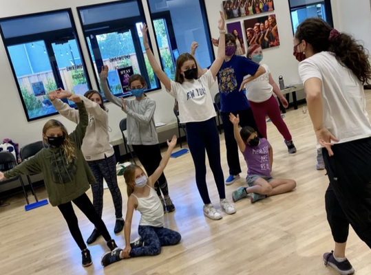 Homeschool - Performing Arts for K-12 - Jr. Productions are the ultimate musical theatre package and focus on fully staging and performing a musical! This class covers all aspects of getting a show on its feet and showcases your triple-threat talent! You will get to experience auditioning with your class, working on harmonies, rehearsing as a team, and performing for friends & family at the end of the rehearsal period. Homeschool - Performing Arts for K-12 - Jr. Productions are the ultimate musical theatre package and focus on fully staging and performing a musical! This class covers all aspects of getting a show on its feet and showcases your triple-threat talent! You will get to experience auditioning with your class, working on harmonies, rehearsing as a team, and performing for friends & family at the end of the rehearsal period.