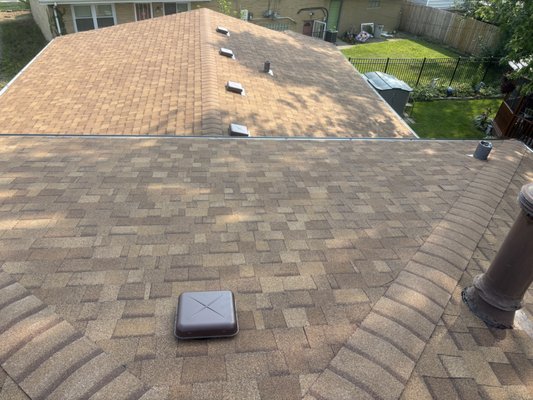 Roof replacement - 25 year old roof and gutter replacement with new Owen’s Corning desert tan architectural shingles and black aluminum gutters Roof replacement - 25 year old roof and gutter replacement with new Owen’s Corning desert tan architectural shingles and black aluminum gutters