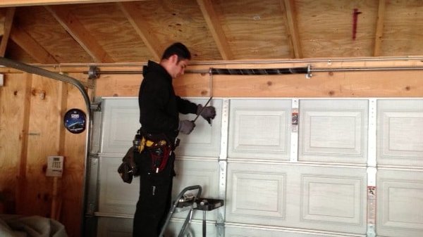 Garage Door Repair - We offer commercial and residential garage door services and repairs, as well as brand new installs throughout the Chicagoland area. We cover peripherals for garage doors, everything from to keypads to spring repairs.
