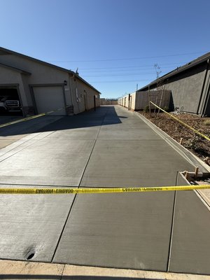 Driveway and patio - It is a 4 inch thick concrete driveway and patio with 3/8 rebar broom finish Driveway and patio - It is a 4 inch thick concrete driveway and patio with 3/8 rebar broom finish