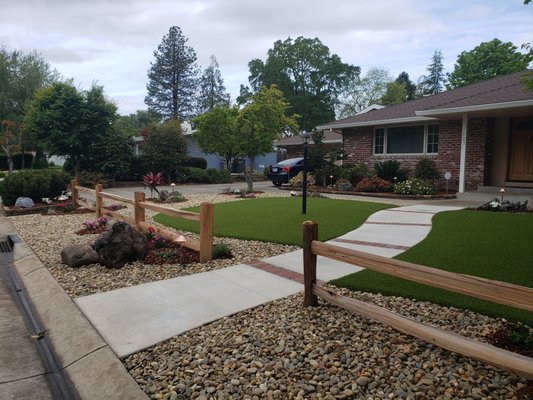 FRONT YARD MAKEOVER - Land Park home - 3rd Generation owner with almost 1800 SF of lawn to water, mow and maintain - we rebuilt this project to expand gardens, add drought tolerant & native plant color, along with an expansive area of artificial grass lawn.  This customer has reduced their use of over100,000 gallons of water per year!