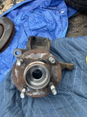 Steering knuckle - 2008 ford focus se had a constant werling noise coming from the front apon inspection we found that the wheel bearing was completely shot and customer opted to replace the full knucke instead of doing just the press in hub and bearing Steering knuckle - 2008 ford focus se had a constant werling noise coming from the front apon inspection we found that the wheel bearing was completely shot and customer opted to replace the full knucke instead of doing just the press in hub and bearing