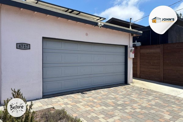 White Garage Door Replacement In San Diego, 92117 - Check out this clean and modern transformation! Our team at John’s Garage Door Services recently completed a Garage Door Replacement project in the 92117 area of San Diego.

The original door had visible wear and a dull finish that was bringing down the curb appeal of the property.

We replaced it with a fresh, white insulated garage door that adds a crisp, updated look to the home’s exterior. Not only does the new door enhance the aesthetics, but it also improves energy efficiency and functionality.

Our client was thrilled with the result!