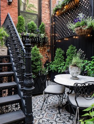 French Urban Oasis - We introduced layers on layers of green and colorful annuals in this tiny backyard to make for a cozy spot and forget you're in middle of a bustling city. The theme for this garden was classical with purple and white accents per homeowner request. We installed an irrigation to each flower box so this garden is completely maintenance free for the rest of the year. French Urban Oasis - We introduced layers on layers of green and colorful annuals in this tiny backyard to make for a cozy spot and forget you're in middle of a bustling city. The theme for this garden was classical with purple and white accents per homeowner request. We installed an irrigation to each flower box so this garden is completely maintenance free for the rest of the year.