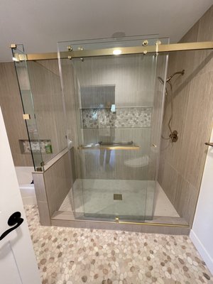 Complete new bathroom built/remodel 2024 - This was a complete bathroom remodel with new framing, insulation, electrical and plumbing as well as walls to support and everything was made/designed custom from the look to the size; with frameless champagne, glass doors, a walk-in shower and a tub. Complete new bathroom built/remodel 2024 - This was a complete bathroom remodel with new framing, insulation, electrical and plumbing as well as walls to support and everything was made/designed custom from the look to the size; with frameless champagne, glass doors, a walk-in shower and a tub.