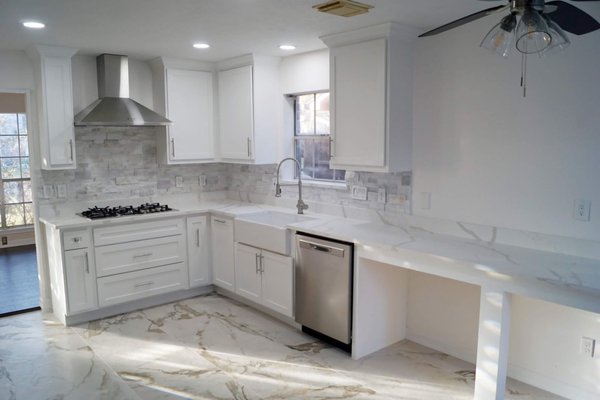 Client with a Fantastic Vision for her Kitchen and Bathroom Areas! - This was a home with a vintage look, and using our clients vision we were able to create a modern, upgraded kitchen and bathrooms. This included all plumbing, electrical, drywall, flooring, tile, custom glass doors in the bathrooms, and new appliance installation.