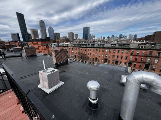 Roof Replacement Project - Our customers had lightning strike a roof top chimney, causing damage to two 5 story walk ups on Massachusetts Avenue in Boston. The brick shrapnel created punctures throughout the membrane. We removed and replaced the roof systems on both units, going back with Reinforced 090mil EPDM. This will give further protection than standard 060mm rubber, guarding against foot traffic from mechanical workers and, should lighting strike twice, the damages will be less intrusive, if at all. Roof Replacement Project - Our customers had lightning strike a roof top chimney, causing damage to two 5 story walk ups on Massachusetts Avenue in Boston. The brick shrapnel created punctures throughout the membrane. We removed and replaced the roof systems on both units, going back with Reinforced 090mil EPDM. This will give further protection than standard 060mm rubber, guarding against foot traffic from mechanical workers and, should lighting strike twice, the damages will be less intrusive, if at all.