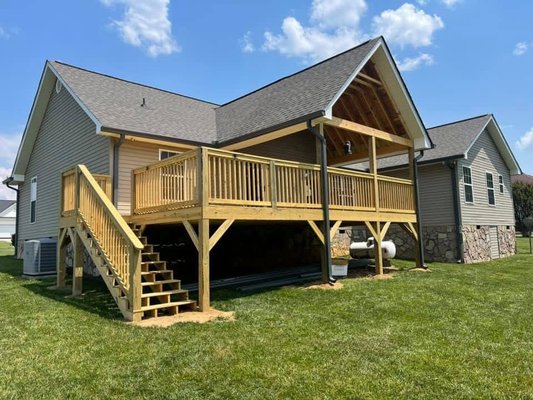 Decks ramps and covered - This year is an overview of many different styles of decks. We have built as we can build any style you would like as we can design and build. Every deck that we build is built with two by tens or more only use 6 x 6 posts or greater everything is screwed in bolted, no nails everything built on footers and up to code.  Decks ramps and covered - This year is an overview of many different styles of decks. We have built as we can build any style you would like as we can design and build. Every deck that we build is built with two by tens or more only use 6 x 6 posts or greater everything is screwed in bolted, no nails everything built on footers and up to code. 