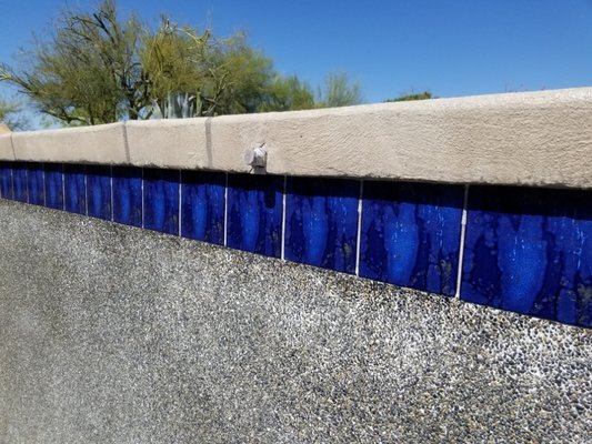 POOL AND SPA TILE CLEANING - This Scottsdale pool features original tile that still looks great after 22 years. We first cleaned the tile five years ago, and our recent service once again removed buildup, restored shine, and preserved the beauty of this classic pool. Phoenix Pool Pros keeps your tile looking its best year after year. POOL AND SPA TILE CLEANING - This Scottsdale pool features original tile that still looks great after 22 years. We first cleaned the tile five years ago, and our recent service once again removed buildup, restored shine, and preserved the beauty of this classic pool. Phoenix Pool Pros keeps your tile looking its best year after year.