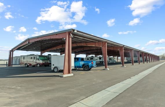 Boat and RV Storage with Optional Electric - Looking for secure boat and RV storage?
Ustick Storage on Middleton Road in Nampa offers both open and covered parking spaces, with sizes up to 12x77 feet.
Our covered spots come with optional 20 amp GFI outlets with lockboxes for added convenience. Trust us to keep your vehicle safe year-round, with options perfect for any size RV or boat. Boat and RV Storage with Optional Electric - Looking for secure boat and RV storage?
Ustick Storage on Middleton Road in Nampa offers both open and covered parking spaces, with sizes up to 12x77 feet.
Our covered spots come with optional 20 amp GFI outlets with lockboxes for added convenience. Trust us to keep your vehicle safe year-round, with options perfect for any size RV or boat.