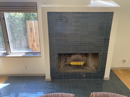 Fire place tile installation - We did a demolition and hauling old slate tile, we did the prep for the new tile.