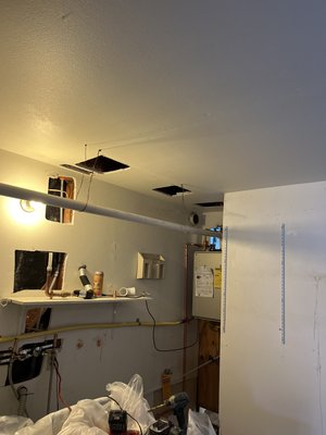 Tankless water heater installation - This was a tankless water heater installation, where we got rid of the old water heater and upgraded to a tankless, and the ventilation was installed across the garage
