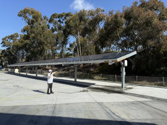Solar Panel Cleaning! - This Solar carport was in need of a deep clean. It had lots of caked on dirt and debris. Our special water-fed spotless deionized water system is able to remove the dirt and when the water dries it’s spotless and streak free!