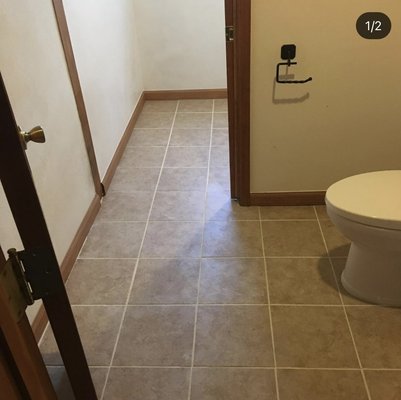 Laundry and bathroom upgrade - Tile replacement, new baseboards, toilet install and repainted vanity Laundry and bathroom upgrade - Tile replacement, new baseboards, toilet install and repainted vanity