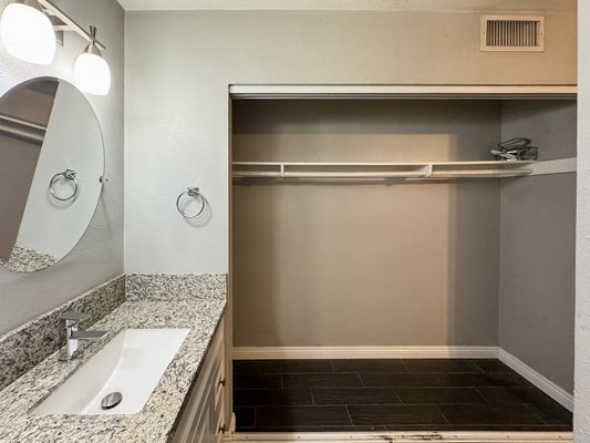 Santa Clarita complete Bathroom Remodeling - We transformed the bathroom into a bathroom with a walk-in closet, pulled permits, and completed everything up to code.

We expanded the bathroom by adding a wall to create a walk-in closet inside the space. We also enlarged the walk-in shower to make it more spacious, added a large shampoo niche, and built a bench for comfortable seating.

We installed a glass shower door and completed a large walk-in closet.

We finished the entire project in just 28 days.