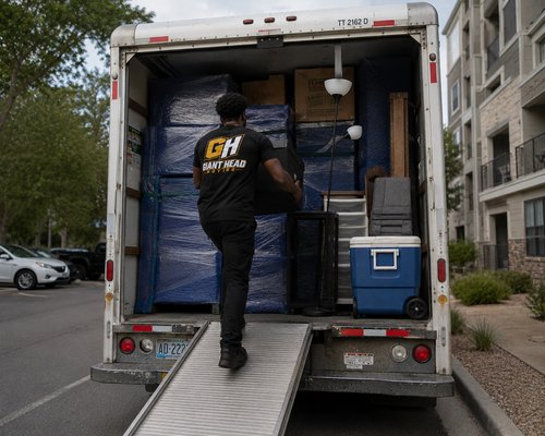 Residential Loading and Furniture Protection - Carefully loaded and organized furniture household items and moving boxes into a residential U-Haul truck using moving blankets shrink wrap and proper stacking techniques to help protect items during transport. Residential Loading and Furniture Protection - Carefully loaded and organized furniture household items and moving boxes into a residential U-Haul truck using moving blankets shrink wrap and proper stacking techniques to help protect items during transport.