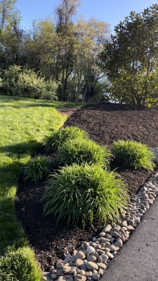 Mulch and Stone Installation - Freshening up the mulch around your shrubs and in your flower beds is an easy and cheap way to enhance the curb appeal landscaping of your home. A layer of mulch is important because it helps discourage weeds and retain moisture. Mulch and Stone Installation - Freshening up the mulch around your shrubs and in your flower beds is an easy and cheap way to enhance the curb appeal landscaping of your home. A layer of mulch is important because it helps discourage weeds and retain moisture.