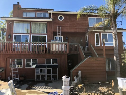 Exterior Wood Siding - This is a ranch home done in Valley Center including a color match for wood siding, deck, stairs, eaves and fascia.
