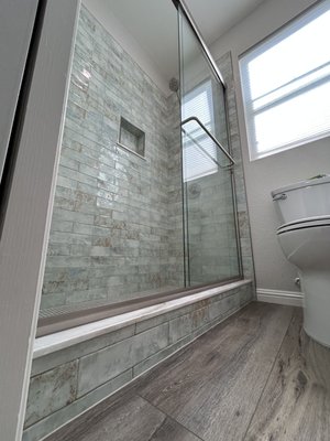 Bathroom Remodel - This was a bathroom remodel that gave the homeowners a rekindled love for their master bathroom. We added a pocket door to give the owners more flow through the area. We also got a rid of a tub and installed a new shower to give them a luxury feel in their home!