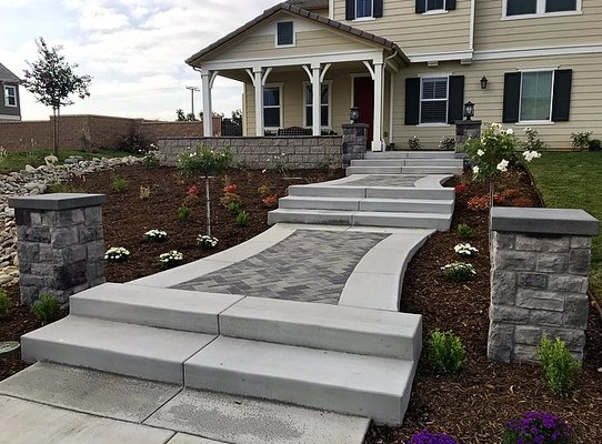 Front yard hardscape steps and courtyard in Rancho Cucamonga - This Etiwanda home needed to make a statement with there entryway. Using pavers, concrete and stone veneer to bring this project together. Designed and installed by Land X landscape construction and architecture Front yard hardscape steps and courtyard in Rancho Cucamonga - This Etiwanda home needed to make a statement with there entryway. Using pavers, concrete and stone veneer to bring this project together. Designed and installed by Land X landscape construction and architecture