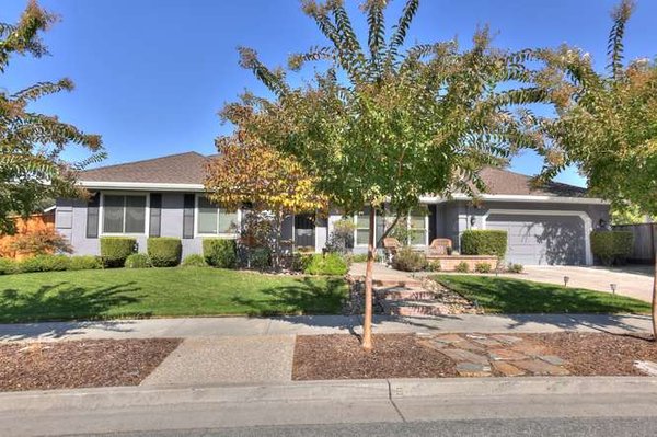9090 Ridgeway Dr, Gilroy CA 95020 - Absolutely wonderful custom home located in western foothills of Gilroy. Rare, Single story home with nearly $100,000 in upgrades. Recent installation of new energy-efficient dual pane windows throughout, laminate/manufactured flooring in living room, hall, dining room & master bedroom. New lighting in kitchen/family room. Dual fireplace in Living room and Family room. Exterior paint for house & custom shed. Newer roof, Pavers installed in front & rear of property, new perimeter fencing. Inviting you into this great home is an attractive & welcoming front patio where you can relax in the afternoon sun. What a great place to call home! 9090 Ridgeway Dr, Gilroy CA 95020 - Absolutely wonderful custom home located in western foothills of Gilroy. Rare, Single story home with nearly $100,000 in upgrades. Recent installation of new energy-efficient dual pane windows throughout, laminate/manufactured flooring in living room, hall, dining room & master bedroom. New lighting in kitchen/family room. Dual fireplace in Living room and Family room. Exterior paint for house & custom shed. Newer roof, Pavers installed in front & rear of property, new perimeter fencing. Inviting you into this great home is an attractive & welcoming front patio where you can relax in the afternoon sun. What a great place to call home!