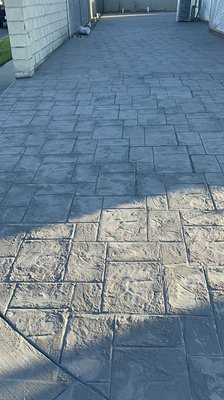 Stamp concrete RV parking - We took the wall down and extended to the front to create a R.V parking with stamp color concrete.