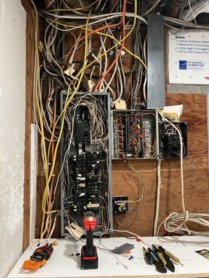 Lake Cabin Panel Upgrade - Panel was an absolute disaster. It had a mix of low voltage and line voltage switching. We removed all low voltage switching, and installed a new panel with organization. New entrance cable and ground rods, landed existing line voltage circuits into new panel, and labeled new panel. Much better! Thanks for looking! Lake Cabin Panel Upgrade - Panel was an absolute disaster. It had a mix of low voltage and line voltage switching. We removed all low voltage switching, and installed a new panel with organization. New entrance cable and ground rods, landed existing line voltage circuits into new panel, and labeled new panel. Much better! Thanks for looking!