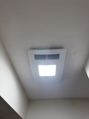 Bath exhaust fan replacement - Removed old exhaust fan. Patched ceiling for new fan dimensions. Matched ceiling texture. Rewired to new fan and reconnected exhaust to roof outlet.