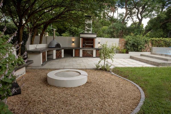 Rustic Outdoor Kitchen & Lounge, Poway - This backyard in Poway was designed to be the ultimate space for entertaining. The clients wanted a fully functional outdoor kitchen paired with a clean, modern patio layout and that’s exactly what we delivered.
We built a custom outdoor kitchen complete with a wood-fired pizza oven, grill, prep counters, and plenty of storage for firewood and tools. The stone and concrete finishes keep the look sleek while blending beautifully with the surrounding greenery. For the patio, we designed a combination of paver styles to give the area texture and flow, with built-in seating and steps that connect seamlessly to the lawn and pool area.
Now, the space works just as well for a weeknight dinner outside as it does for hosting a full gathering with family and friends.
💬 Thinking about adding an outdoor kitchen or entertainment space? Message us today and let’s start planning your dream backyard. Rustic Outdoor Kitchen & Lounge, Poway - This backyard in Poway was designed to be the ultimate space for entertaining. The clients wanted a fully functional outdoor kitchen paired with a clean, modern patio layout and that’s exactly what we delivered.
We built a custom outdoor kitchen complete with a wood-fired pizza oven, grill, prep counters, and plenty of storage for firewood and tools. The stone and concrete finishes keep the look sleek while blending beautifully with the surrounding greenery. For the patio, we designed a combination of paver styles to give the area texture and flow, with built-in seating and steps that connect seamlessly to the lawn and pool area.
Now, the space works just as well for a weeknight dinner outside as it does for hosting a full gathering with family and friends.
💬 Thinking about adding an outdoor kitchen or entertainment space? Message us today and let’s start planning your dream backyard.