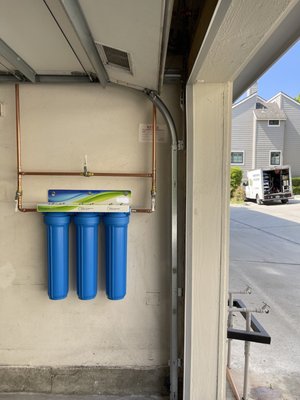 Space Saving Whole House Water Filtration System and Purified Drinking Water Filter - We use the highest grade catalytic activated coconut shell carbon on the market giving you better than bottled water quality from every tap in your home, saving money and helping the environment.

High-grade catalytic activated coconut carbon that is solid block technology. Our carbon block technology filters both chlorine and chloramine giving you the best possible filtration from every tap in your home.

Local cities and municipalities often use both chlorine and chloramine throughout the year for disinfection so picking the filtration system that addresses both chemicals is very important.

Designed for homes with 1-3 bathrooms. There’s virtually no pressure drop and has a high 15-gallon per minute flow rate. So whether you have a 1 bathroom or a 3-bathroom home, one system is all you need!

Get our very best space saving Whole House Water Filter plus our very best drinking water system for one low price. Most systems of this type average under $4,500!

Price includes tax, labor, all parts needed for professional installation.

Lifetime warranty included on our space saving whole house water filtration system.