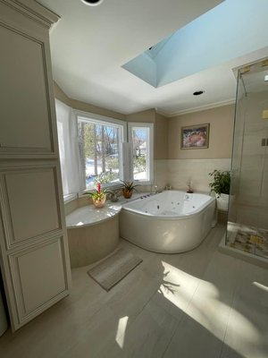Bathroom Renovation - Luxury bathroom renovation! The bathroom was gutted and layout was adjusted to create a more functional layout. All tile was custom ordered European tile and was meticulously installed.