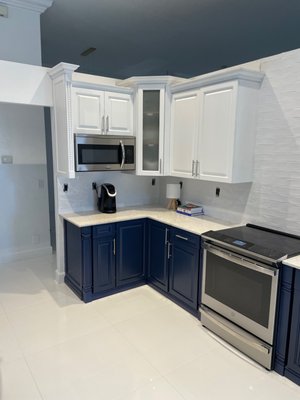 Bold kitchen remodel - To call this luxury remodel eye-catching, is an understatement. From the large tile flooring choice, to the two-toned cabinet concept, this remodel is one to be envied. With HT Construction, we bring your visions to life, and with this customer- designed, detached island, we made sure to do just that! Bold kitchen remodel - To call this luxury remodel eye-catching, is an understatement. From the large tile flooring choice, to the two-toned cabinet concept, this remodel is one to be envied. With HT Construction, we bring your visions to life, and with this customer- designed, detached island, we made sure to do just that!