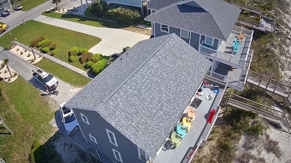 Surf City Fortified Roof - Work with a view! This Surf City beach home received a brand new IBHS grant. This new Fortified roof should stand up to the elements. If you need help with this process, give us a call today! Surf City Fortified Roof - Work with a view! This Surf City beach home received a brand new IBHS grant. This new Fortified roof should stand up to the elements. If you need help with this process, give us a call today!