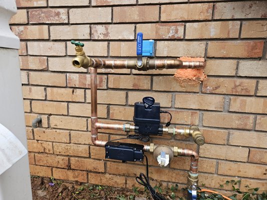 Moen Flo Smart Water Monitor & Shutoff Installation - Project Details: Our team recently completed the installation of a Moen Flo Smart Water Monitor & Shutoff for a customer who required this device to meet a requirement by Farmers Insurance. This involved a comprehensive rebuild of the customer’s water service to accommodate the new Moen Flo valve and meet their specific water management needs.

Scope of Work:

Installed Moen Flo Smart Water Monitor & Shutoff valve.
Rebuilt the main water service to include:
New shutoff valve for rooftop sprinklers.
Pressure-reducing valve.
Isolation valve.
Main house water shutoff.
Replaced a small PVC section in the irrigation line.

Outcome: After a thorough rebuild and installation, we tested the water service, ensuring it was free of leaks and fully operational. The system is now ready to monitor and protect against potential water issues, providing the customer with peace of mind and meeting their insurance requirements.