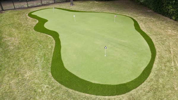 Over 2000 Square Foot Putting Surface In Preston Hollow - This is a 2000 sqft putting surface that we installed in Preston Hollow. All of our turf is American Made with a 15 year product warranty. Over 2000 Square Foot Putting Surface In Preston Hollow - This is a 2000 sqft putting surface that we installed in Preston Hollow. All of our turf is American Made with a 15 year product warranty.