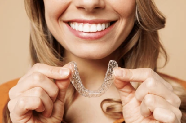 Invisalign - The makers of Invisalign set out to achieve something that had yet to be done: to create a system that could straighten teeth without the telltale signs of braces. Judging by the immense popularity of Invisalign after several years of clinical use, they succeeded. What this means is that you can succeed in getting the healthier, more attractive smile you want in a manner that is more comfortable and discreet.