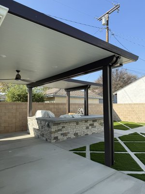 Romero Backyard Remodel - This backyard remodel with a custom barbecue island with a patio cover built into it perfectly flowed without having the need for patio to be any obstacle. Romero Backyard Remodel - This backyard remodel with a custom barbecue island with a patio cover built into it perfectly flowed without having the need for patio to be any obstacle.