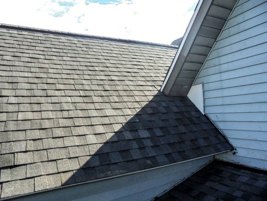 Residential Roofing - This roof was completed for a local family.  HERE tore off the old shingles, redecked part of the home (Replaced rotted wood) and reshingled the home.  We Specialize in residential asphalt roofing and guarantee our workmanship. We will never put a roof on your home that we wouldnt put on our own!