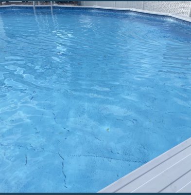 Pool opening - After winter, a pool cleaning involves removing debris, balancing chemicals, scrubbing surfaces, and ensuring equipment runs smoothly for a fresh, swim-ready start!